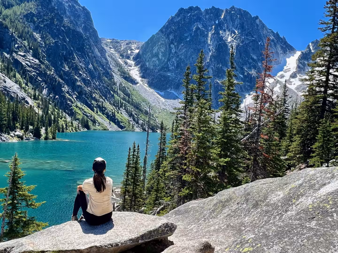 Turquoise water of Colchuck Lake below Dragontail Peak in the Enchantments, a day hike from Leavenworth